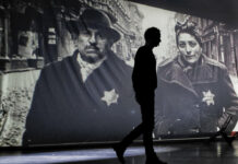 Auschwitz Survivors Pay Homage as World Remembers Holocaust An actor of the Romania's Jewish State Theatre rehearse the musical drama "The Lights of the Ghetto" a mix of music and stories by Holocaust survivors in Bucharest, Romania, Saturday, Jan. 26, 2019, a day before the premiere on International Holocaust Remembrance Day. Photo: Vadim Ghirda / Associated Press
