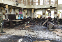 20 Dead as Bombs Target Sunday Mass in Philippine Cathedral A soldier views the site inside a Roman Catholic cathedral Sunday in Jolo, the capital of Sulu province in the southern Philippines after two bombs exploded. Photo: WESMINCOM Armed Forces of the Philippines Via AP