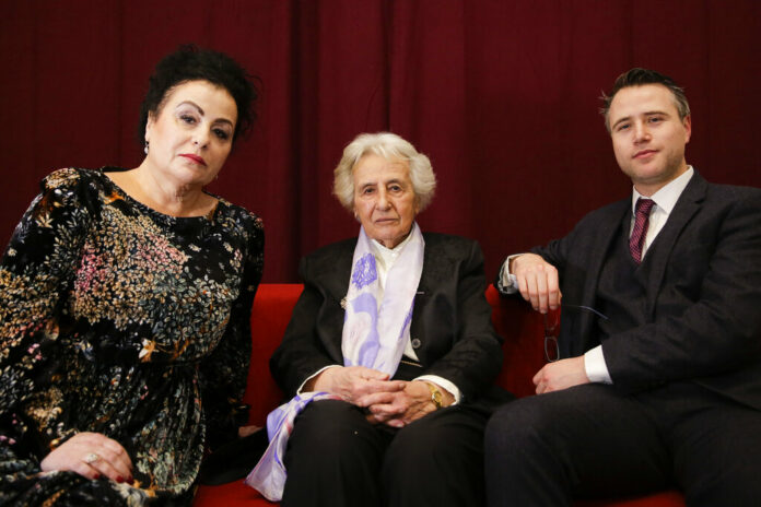 Holocaust survivor Anita Lasker-Wallfisch, center, her daughter Maya Jacobs Lasker-Wallfisch, left, and her grandson Simon Wallfisch, right, the son of Maya Jacobs Lasker-Wallfisch, pose Sunday for a photo after an interview with the Associated Press in Berlin, Germany. Photo: Markus Schreiber / Associated Press