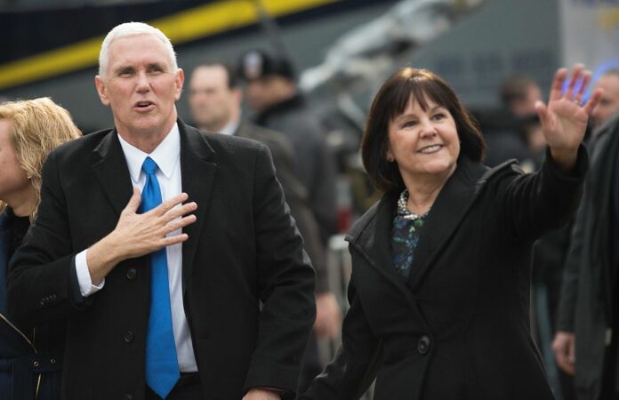 US Vice-President Mike Pence, left, and Second Lady Karen Pence walk pass the inaugural parade in 2017 reviewing stand in the 58th Presidential Inaugural parade in Washington D.C. Photo: Gabriel Silva / U.S. Army