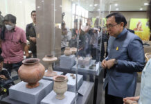 Millennia-Old Thai Antiquities Returned From US Collections Culture Minister Vira Rojpojchanarat surveys Thai artifacts returned from the United States at the National Library on Thursday in Bangkok.