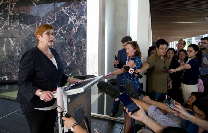 Australia's Foreign Minister Marise Payne, at left, gestures as she answers questions Thursday in Bangkok. Photo: Gemunu Amarasinghe / Associated Press