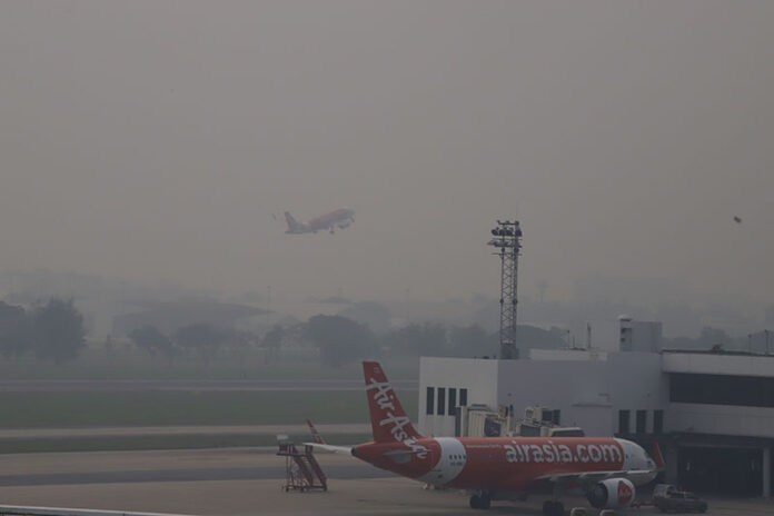 Smog seen Jan. 17 over Don Mueang Airport. Smog seen Jan. 17 over Don Mueang Airport.