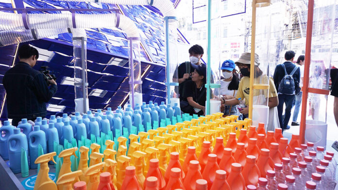 Visitors check out displays on the opening day of Bangkok Design Week Saturday at TCDC.