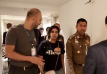 Saudi Woman Leaves Bangkok Airport Under UN Care Rahaf Alqunun, at center, is escorted by immigration chief Surachate Hakparn, at right, Monday at Bangkok's Suvarnabhumi Airport.