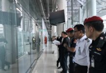 Standoff at Suvarnabhumi as Saudi Woman Resists Deportation Officers in front of the Immigration Bureau Police operation center on Monday afternoon at Suvarnabhumi International Airport in Bangkok.