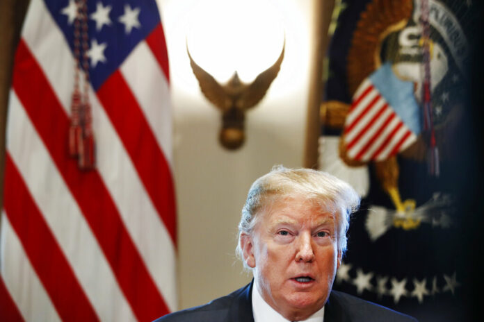 US President Donald Trump leads a round-table discussion on border security Friday with local leaders in the Cabinet Room of the White House. Photo: Jacquelyn Martin / Associated Press