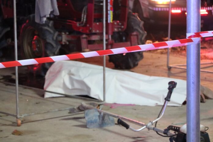 Police inspect the crime scene in Uttaradit province on Sunday.