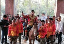 Candidates Register to Run in 1st Post-Coup Election Dramatic Entry: Pheu Thai Party candidate Saranwut Saranket rolled up on the Uttaradit province registration center on horseback in a Thai warrior costume,saying he was there to kick out the dictatorship.