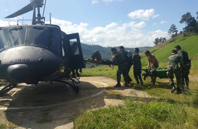 Two wounded soldiers are brought to a medevac Nov. 6, 2016, after a clash with unidentified gunmen along Thai-Myanmar border in Chiang Mai province.