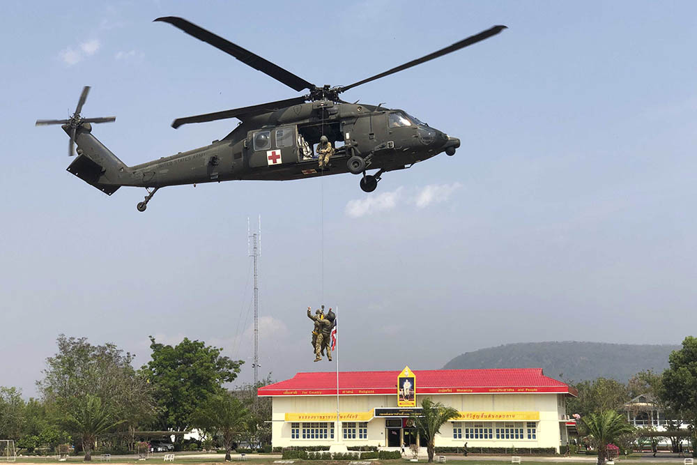 Soldiers with the 25th Aviation Regiment and 1-2 Stryker Brigade Combat Team conduct hoist training Sunday in Phitsanulok province. Photo: U.S. Army