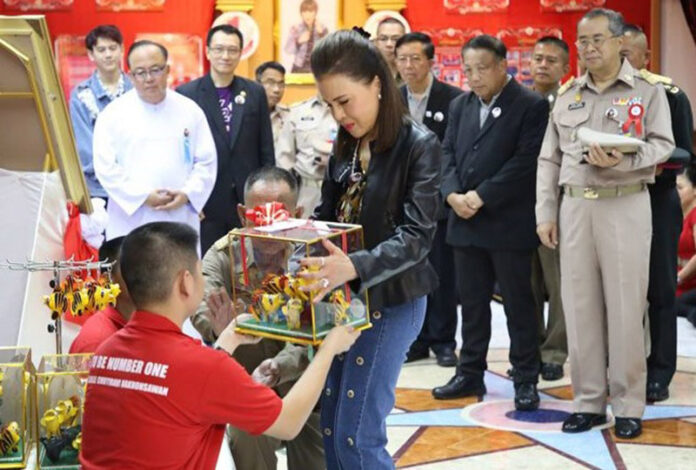 Ubolratana Mahidol receives a gift from a student Feb. 12, 2019 while visiting Nakhon Sawan province to promote her anti-drug abuse foundation. Photo: Nakhon Sawan Public Relations Department