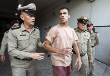 Hakeem Case Different from Rahaf, ‘Big Joke’ Says Bahraini Hakeem al-Araibi, center, leaves the criminal court in Bangkok, Thailand, Bangkok, Thailand, Monday, Feb. 4, 2019. The soccer player who has refugee status in Australia told a Thai court Monday that he refuses to be voluntarily extradited to Bahrain, which has asked for his return to serve a prison sentence for a crime he denies committing. Photo: Wason Wanichakorn / AP