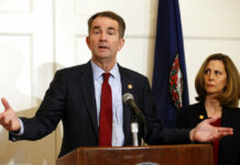 Yearbook Staff Disagree on Whether Racist Photo Was Mix-Up In this Feb. 2, 2019, photo, Virginia Gov. Ralph Northam, left, accompanied by his wife, Pam, speaks during a news conference in the governor's mansion in Richmond, Virginia. Photo: Steve Helber / Associated Press