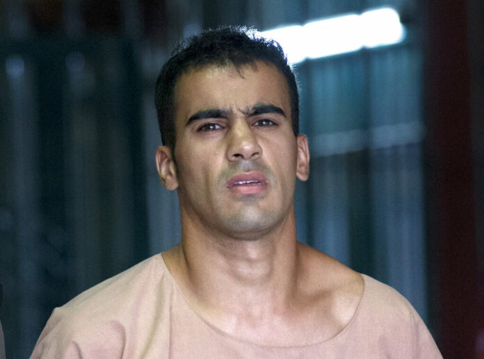 Refugee football player Bahraini Hakeem al-Araibi leaves the criminal court Feb. 4 in Bangkok, Thailand. Photo: Sakchai Lalit / Associated Press