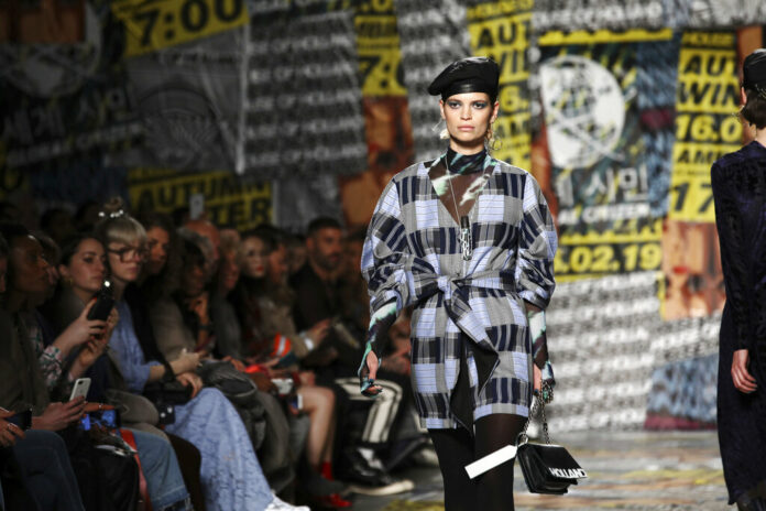 Model Pixie Geldof wears a creation by designer House of Holland at the Autumn/Winter 2019 fashion week runway show Saturday in London. Photo: Grant Pollard / Associated Press