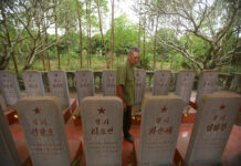 Vietnam Memorial to North Korea Pilots Marks Bygone Alliance War veteran Duong Van Dau walks in between a row of headstones Saturday at a memorial for North Korean fallen pilots in Bac Giang province, Vietnam. Photo: Hau Dinh / Associated Press