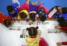 Hanoi Postcard: Children Hope to Give Kim Comradely Welcome