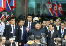 Kim Jong Un Arrives in Vietnam for Summit With Trump North Korean leader Kim Jong Un waves Tuesday upon arrival by train in Dong Dang in Vietnamese border town. Photo: Minh Hoang / Associated Press