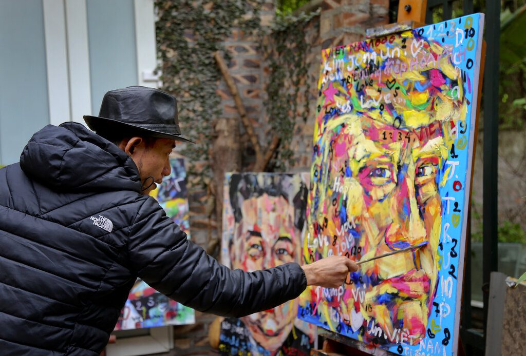 In this Feb. 25, 2019, photo, Tran Lam Binh puts the final touches to a portrait of U.S. President Donald Trump in Hanoi, Vietnam.Photo: Tran Van Minh / Associated Press