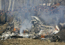 Pakistan Says It Downed 2 Indian Warplanes, Captured Pilot Kashmiri villagers gather near the wreckage of an Indian aircraft Wednesday after it crashed in Budgam area, outskirts of Srinagar, Indian controlled Kashmir. Photo: Mukhtar Khan / Associated Press
