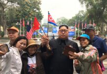 Vietnam Orders Deportation of Thai ‘Kim Jong Un’ (Video) Kim Jong Un impersonator Uthen Lueangsaengthong, third from right, takes selfies with passersby Wednesday in Hanoi, Vietnam.
