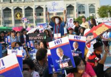 More People Register to Vote Early Than in 2014 Pheu Thai Party supporters rally Feb. 15 in Bangkok.