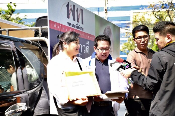 Pheu Thai MP candidate Leelawadee Watcharobol talks to reporters Thursday.