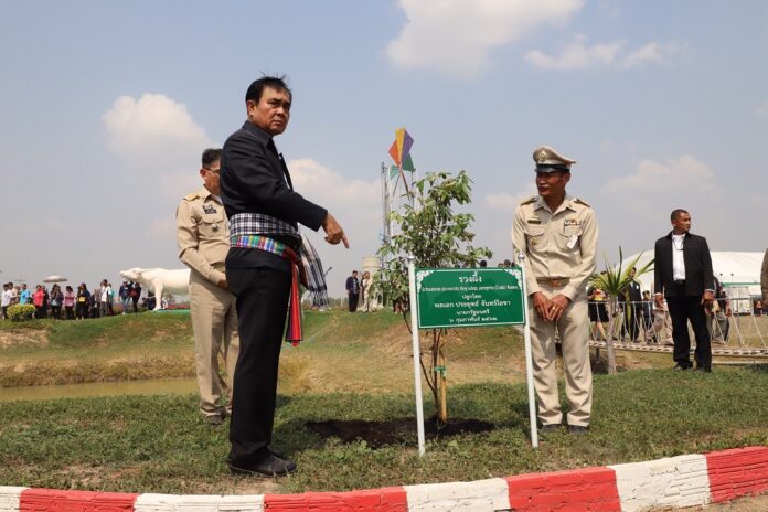 Sowing seeds of doubt? Junta chairman Prayuth Chan-ocha shows reporters a tree he just planted today in Yasothon province