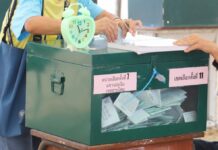 Commissioners Confirm Voiding of All NZ Ballots A voter cast a ballot March 24 in Bangkok's Sai Mai district.