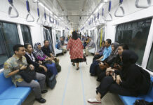 Jakarta’s 1st Subway to Ease Frustration, Sweat and Fumes People ride on a Mass Rapid Transit (MRT) in February during a trial run in Jakarta, Indonesia. Photo: Achmad Ibrahim / Associated Press