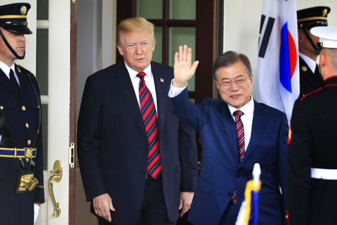 FILE - In this May 22, 2018, file photo, South Korean President Moon Jae-in waves as he is welcomed by U.S. President Donald Trump to the White House in Washington. Photo: Manuel Balce Ceneta / Associated Press