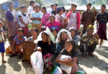 Report: Myanmar, China Failing to Stop ‘Bride’ Trafficking Kachin refugees wait for rations in 2013 at the Je Yang IDP camp, the biggest and closest camp to Laiza, Laiza, northeastern Myanmar. Photo: Yadana Htun / Associated Press
