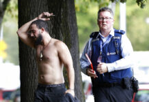 49 Killed in New Zealand Mosque Shootings; 4 Held