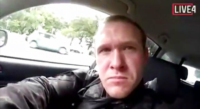 This frame from video that was livestreamed Friday, March 15, 2019, shows a gunman, who used the name Brenton Tarrant on social media, in a car before the mosque shootings in Christchurch, New Zealand. This frame from video that was livestreamed Friday, March 15, 2019, shows a gunman, who used the name Brenton Tarrant on social media, in a car before the mosque shootings in Christchurch, New Zealand.