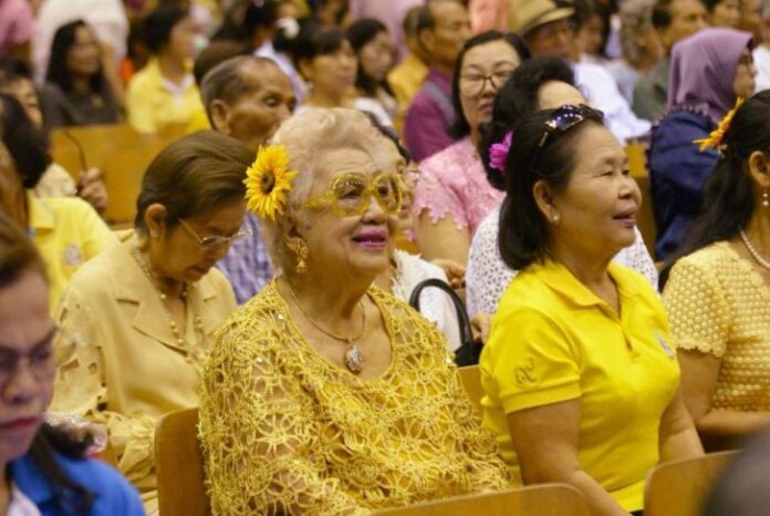 An audience listens to speeches marking the UN's International Day of Older Persons Oct. 2018 in Bangkok.