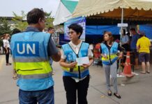 Poll Observers Not Confident Election Free or Fair UN employees Sunday at a Bangkok polling station.