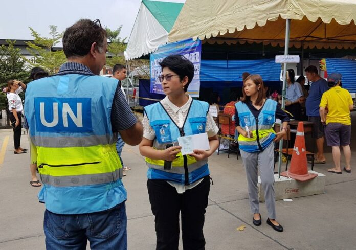 UN employees Sunday at a Bangkok polling station. UN employees Sunday at a Bangkok polling station.
