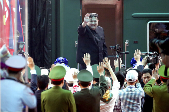 North Korean leader Kim Jong Un waves at the Dong Dang railway station Saturday in Dong Dang, Vietnam. Photo: Minh Hoang / Associated Press