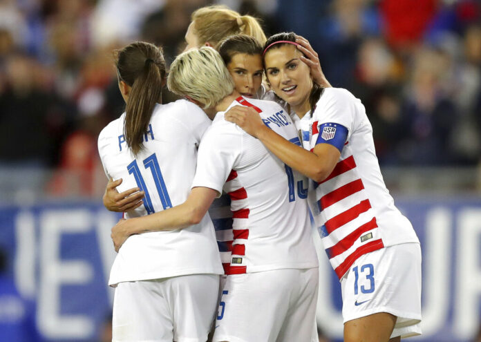 United States' Tobin Heath, second from right, is congratulated on her goal by Mallory Pugh (11), Megan Rapinoe and Alex Morgan (13) during the first half of a SheBelieves Cup soccer match against Brazil Tuesday, March 5, 2019, in Tampa, Florida. Photo: Mike Carlson / Associated Press