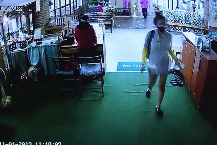 A screenshot of security footage released by police shows the pregnant woman entering the massage parlor on Jan. 11 in Chiang Mai province.