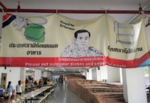 Opinion: Mistrust Prevails Following ‘The General’s’ Election A poster with an image of junta leader Prayuth Chan-ocha telling Thammasat University students to put their dishes at proper places after eating at a canteen.