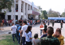 More Election Blunders Reported as Scores Flock to Vote Early Long queues of voters outside a polling station Sunday in Nakhon Ratchasima province.