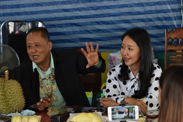 Arnon Rodthong and Karnsita Rodthong speak at a news conference Monday.