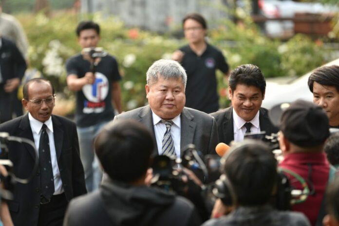 Premchai Karnasuta arrives Tuesday at the Thong Pha Phum Provincial Court in Kanchanaburi province. Premchai Karnasuta arrives Tuesday at the Thong Pha Phum Provincial Court in Kanchanaburi province.
