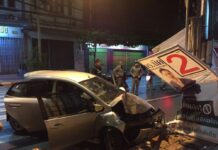 Traffic Violations Soaring Because Drivers Don’t Care: Police Police officers stand near the scene of a fatal car crash Thursday morning in Bangkok.