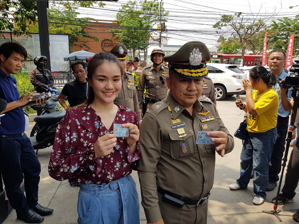 Srivara Ransibrahmanakul, right, and his daughter at a polling station Sunday in Bangkok.