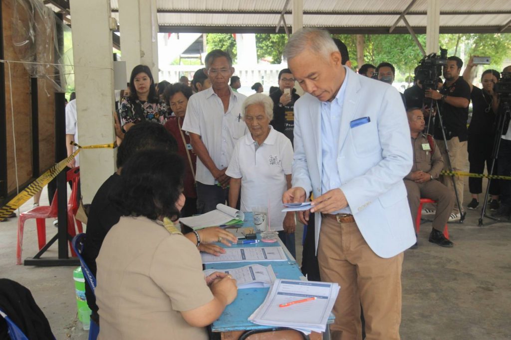 Suwat Liptapanlop votes Sunday in Korat.