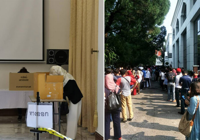 At left, Thais in Malaysia use cardboard boxes to vote Saturday in Kuala Lumpur. Photo: Muhammad Sasu / Facebook. At right, long lines outside the embassy on the same day. At left, Thais in Malaysia use cardboard boxes to vote Saturday in Kuala Lumpur. Photo: Muhammad Sasu / Facebook. At right, long lines outside the embassy on the same day.