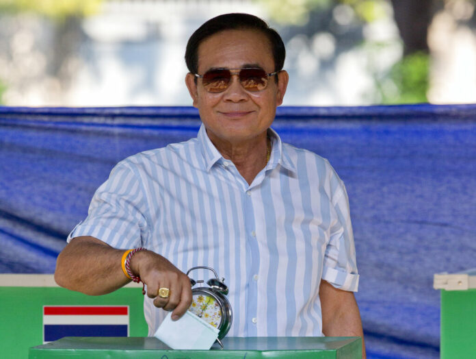Junta leader-cum-Prime Minister Prayuth Chan-ocha casts his vote at a polling station March 24 in Bangkok. Photo: Gemunu Amarasinghe / Associated Press